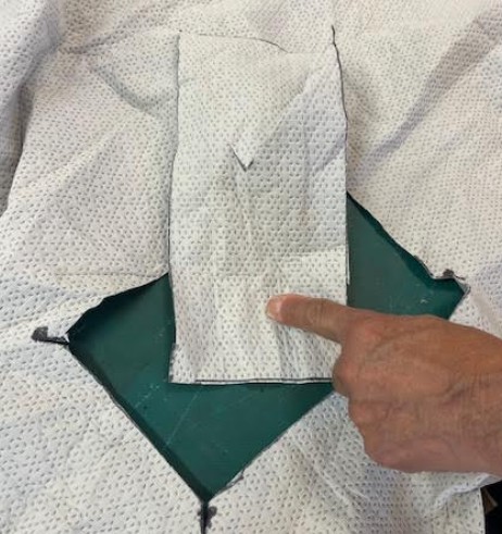 Saving cut fabric piece for potential glue cleanup during installation